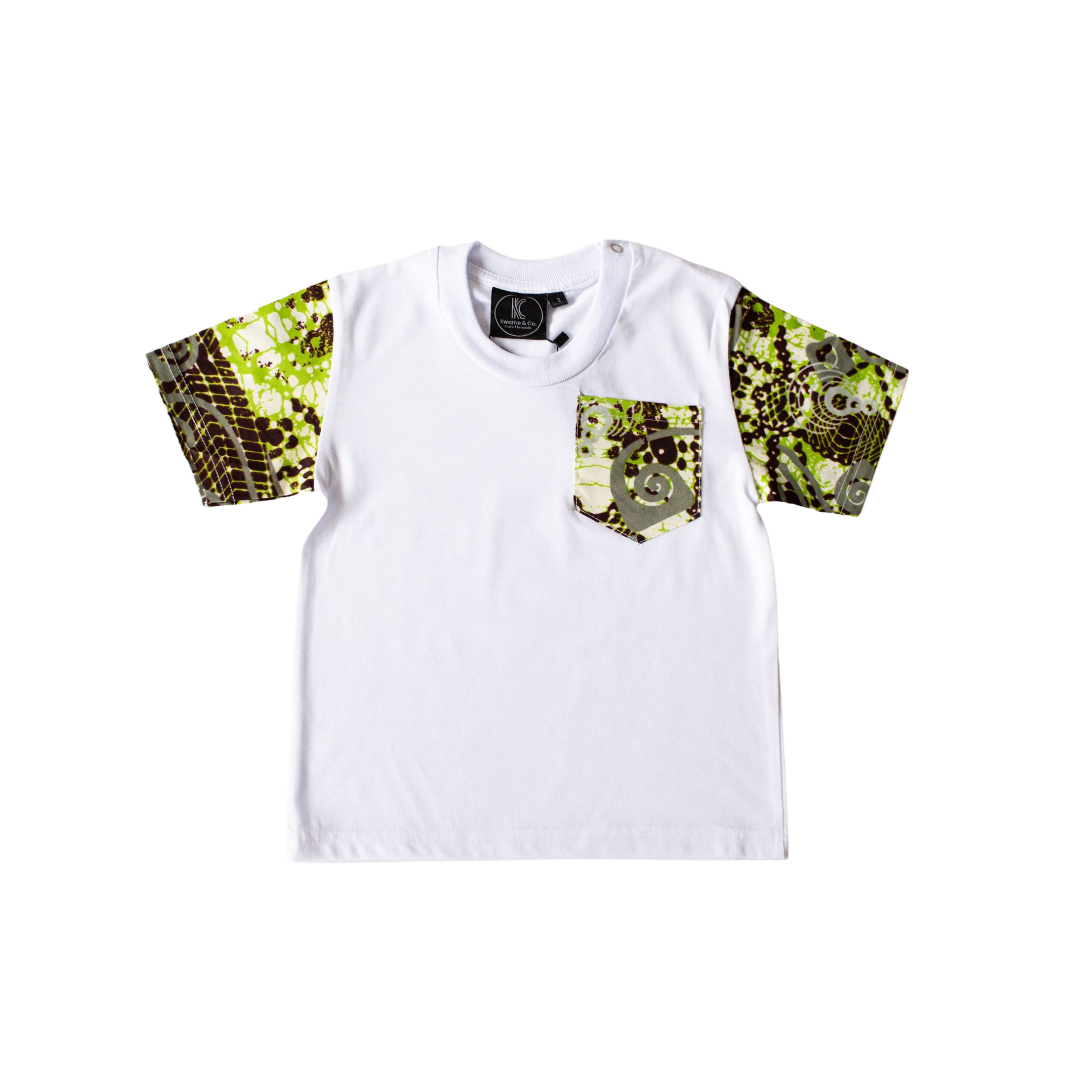 “Children’s white t-shirt with green African wax print sleeves and pocket — front view”